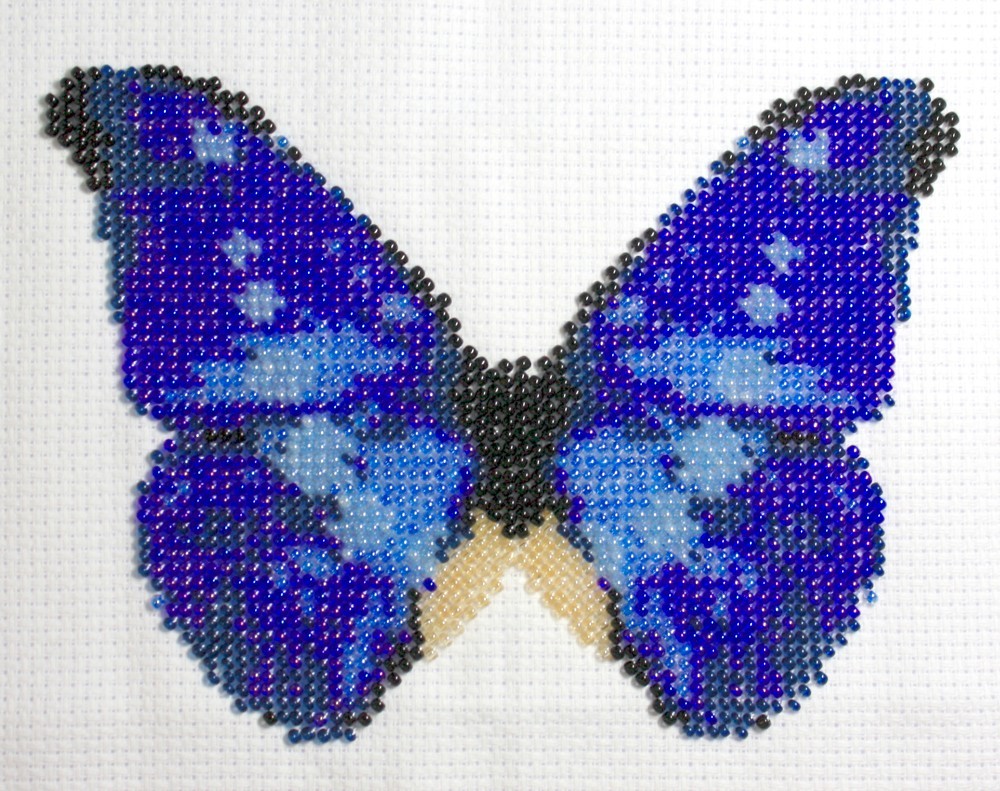 Borduurpakket vlinder blauw/bruin 11x16cm.
