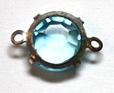 Tussenstuk 12mm met 7mm chaton aqua p.st
