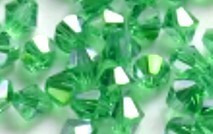 Facetkraal 4mm bicone tr.d.groen AB 50st.