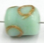 glaskraal ton 10x9mm licht groen goud 25st.