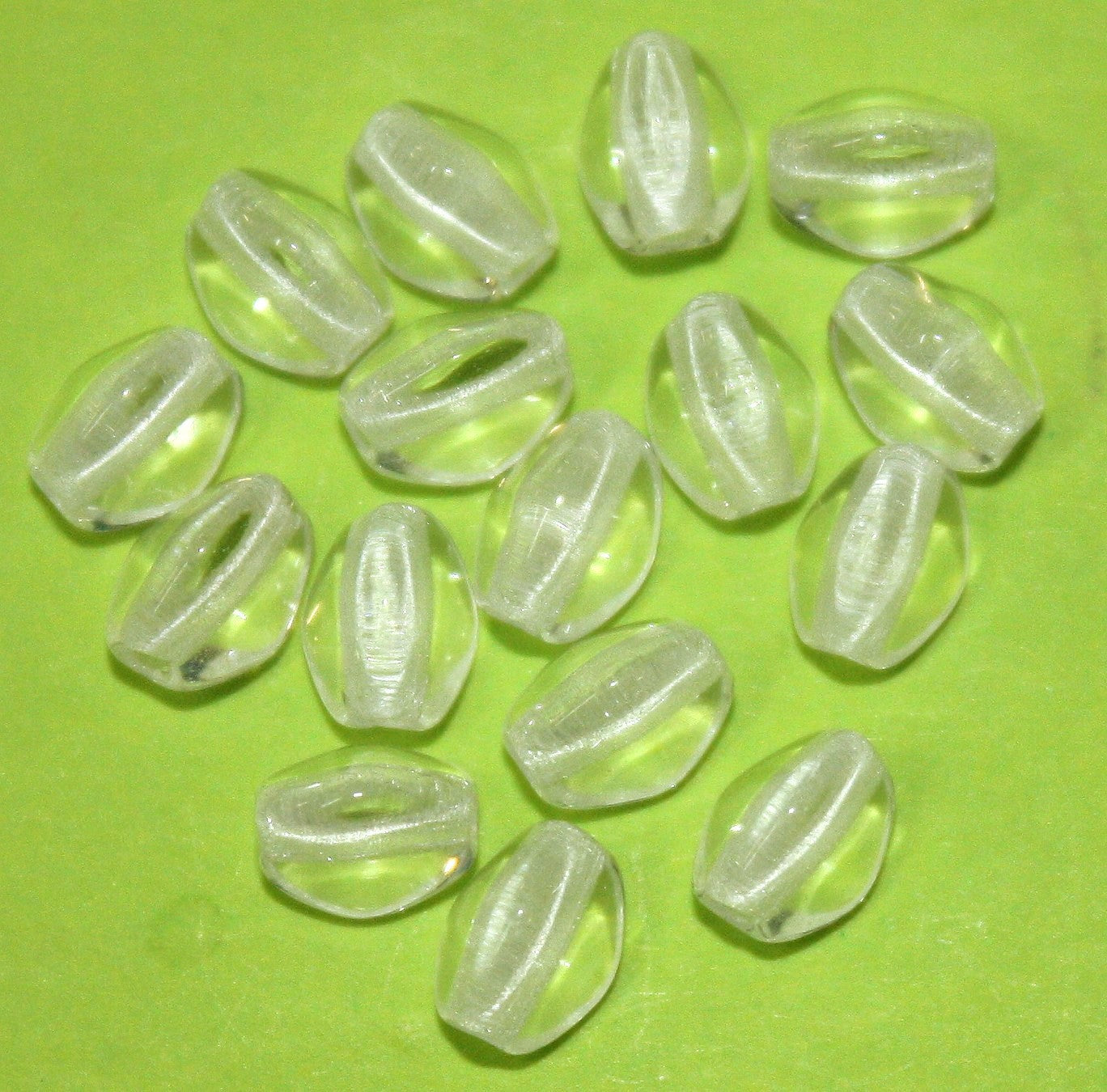 Glaskraal 3x5mm beukenoot kristal 100st.