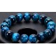 Edelsteen 8mm tijgeroog blauw armband ca 20cm.