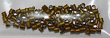 Knijpkralen 2mm staafvorm oud goudkl. 100st.