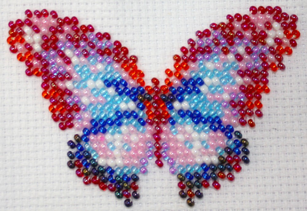 Vlinder multicolor 6x8 cm.