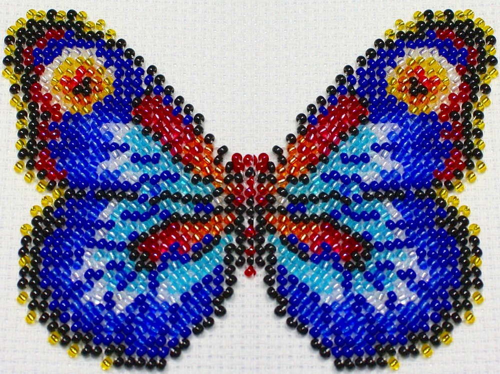 Vlinder multicolor 8x11 cm.