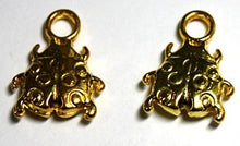 Metalen hanger lieveheersbestje goudkl. 2st