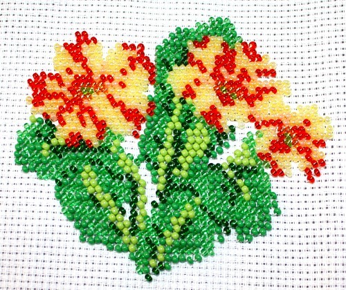 Borduurpakket primula oranje geel 8x10cm