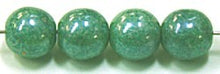 Glaskralen 8mm groen parelmoer ca.16 stuks
