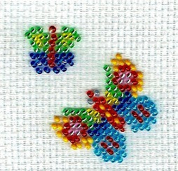 Borduurpakket 2 kleine vlinders 7x7cm