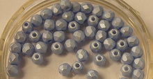 Facetkraal 3mm albast babyblue gecoat 50st.