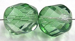 Facetkraal 14mm draaiend gefacetteerd  tr.groen 5s