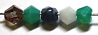 Facetkraal 4mm konisch mix opaque kleuren 50st.