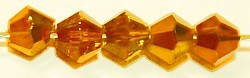 Facetkraal 4mm konisch d.geel goud gecoat 50st.