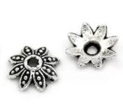 Kralenkapje 10mm bloemmotief zkl. 10st