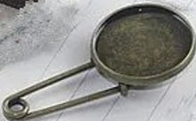 Kiltspeld 50mm oudgoudkl. voor 20mm cabochon