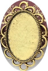 Kastje voor ovale cabochon 18x25mm goudkl.