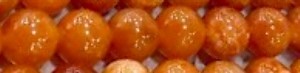 Edelsteen Oranje zonnesteen 8mm streng ca 47st.