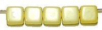 TILA kralen 6x6mm snowwhite/geel gelusterd 25st.