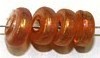 Glaskraal 4x6,5mm  tr. oranje AB ca 200st.
