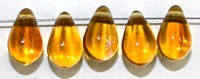 Glasdruppel 6x9mm tr. topaasbr. AB 25st.