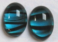 Cabochon 18mm transp. blauw/zwart 2st